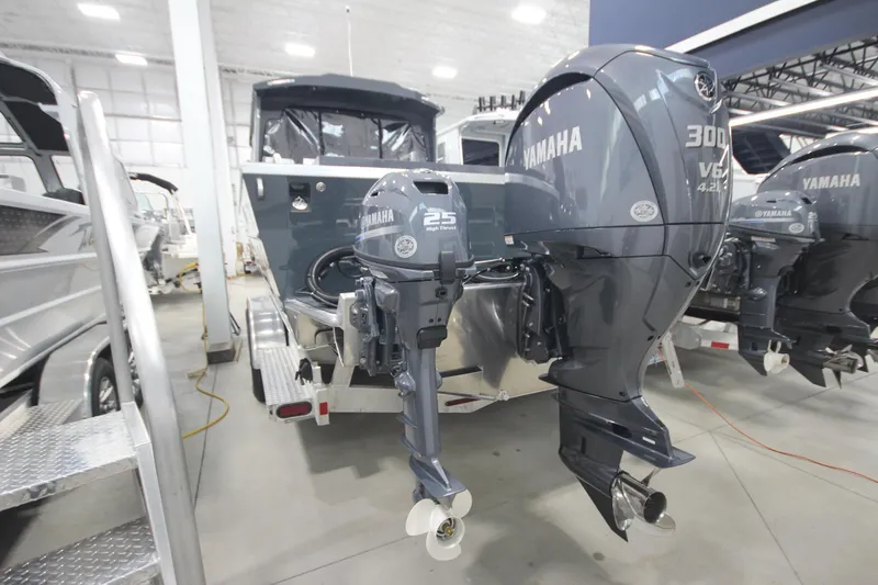 Slide: The Image of 2026 Weldcraft 240 Ocean King boat with Yamaha outboard engines in showroom. - 7