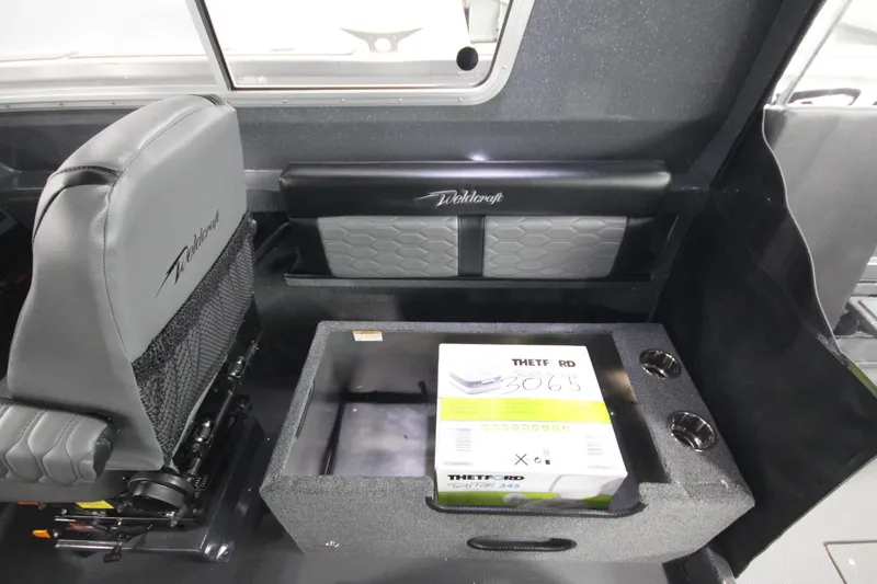 Slide: The Image of Interior of 2026 Weldcraft 240 Ocean King F300XCB boat with seating and storage. - 26