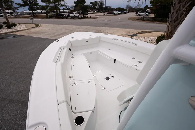 Slide: The Image of 2026 Sea Pro 202 Center Console boat interior, featuring spacious seating and storage compartments. - 15