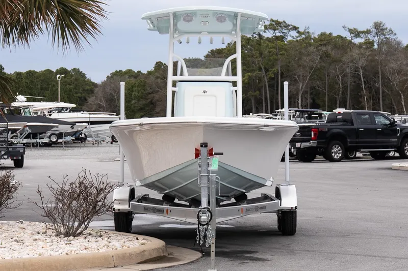 Slide: The Image of 2026 Sea Pro 202 Center Console boat on trailer in parking lot. - 3