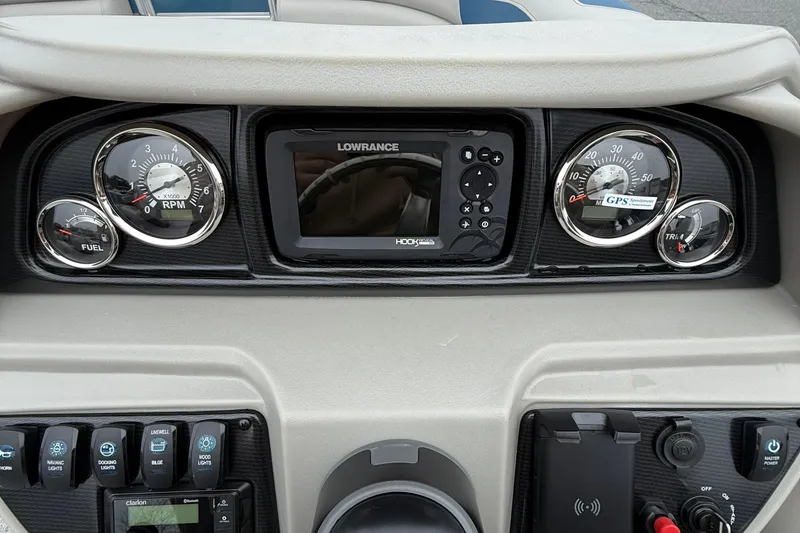 Slide: The Image of Dashboard of 2026 Berkshire 22RFX LE boat with gauges and Lowrance display. - 11