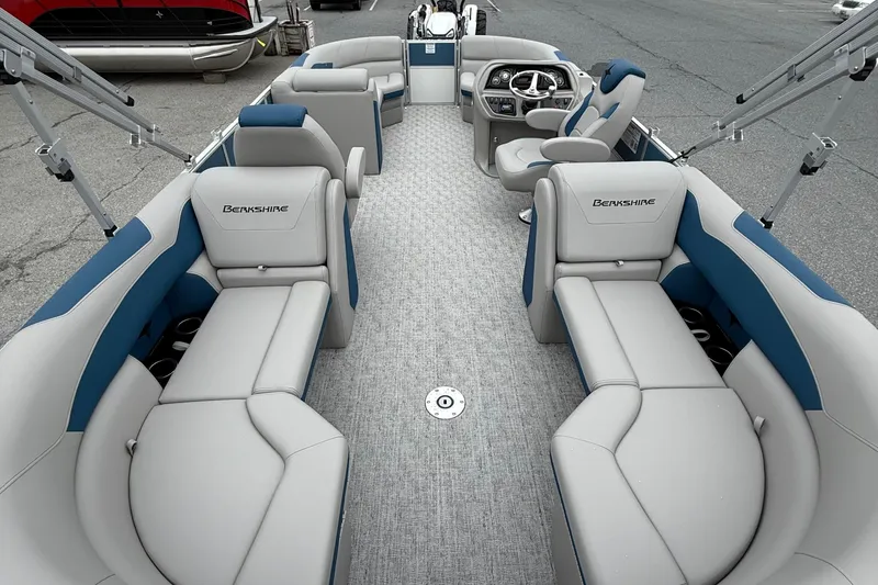 Slide: The Image of 2026 Berkshire 22RFX LE pontoon boat interior with luxurious seating and modern design. - 9