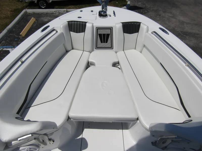 Slide: The Image of 2024 Wellcraft 243 Fisherman boat with white cushioned seating area. - 8
