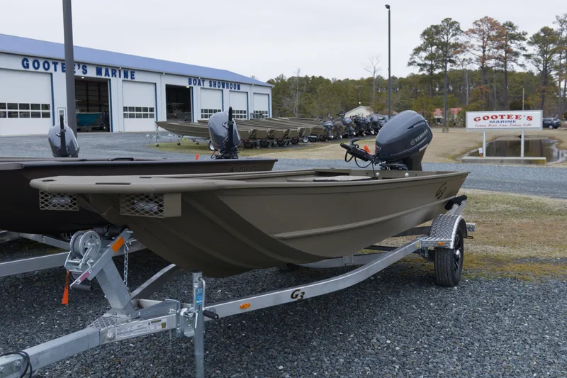 Slide: The Image of 2026 G3 Gator Tough 16 FL boat on trailer at Gootee's Marine showroom. - 3