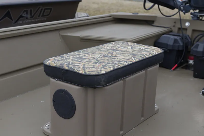 Slide: The Image of 2026 G3 Gator Tough 16 FL boat interior with camo-patterned seat cushion. - 8