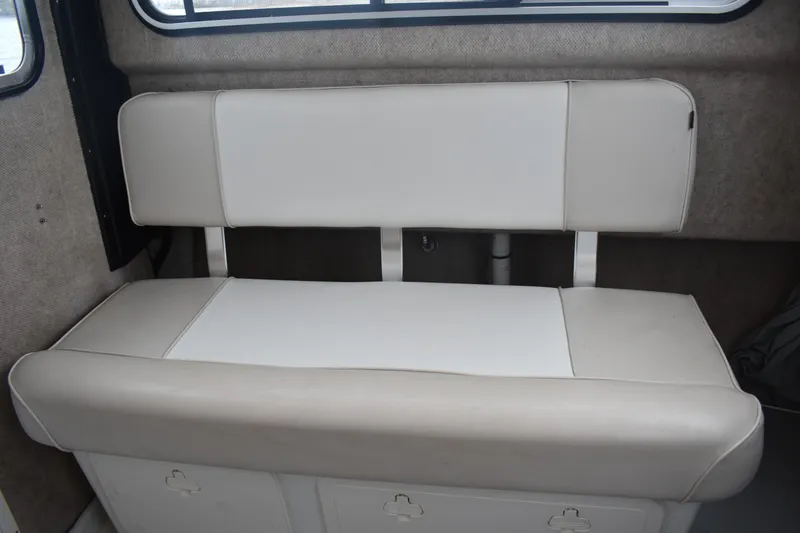 Slide: The Image of 2015 Parker 2320 SL Sport Cabin interior bench seat, beige upholstery. - 18