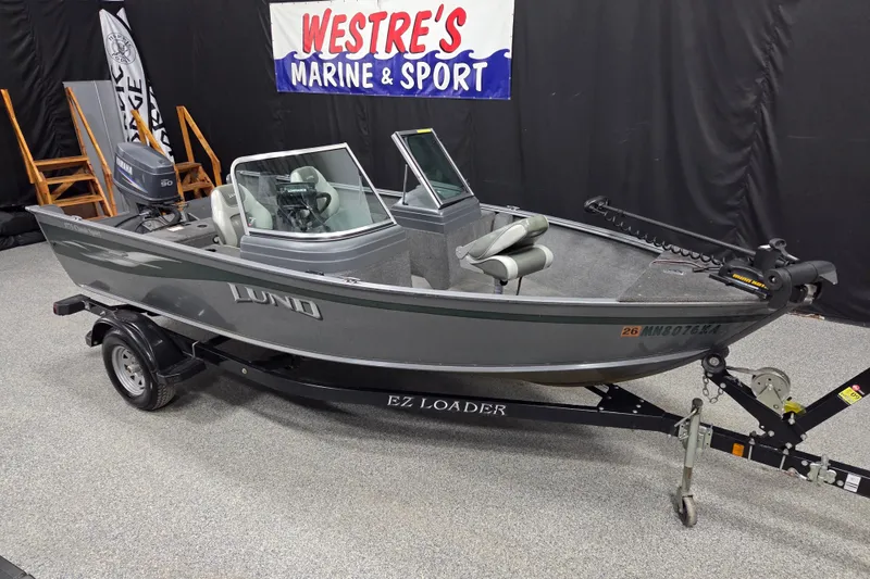 The Image of 2006 Lund 1775 Classic Sport boat on EZ Loader trailer at Westre's Marine & Sport. - 2