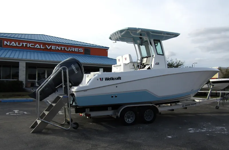 Slide: The Image of 2025 Wellcraft 243 Fisherman boat on trailer at Nautical Ventures. - 3