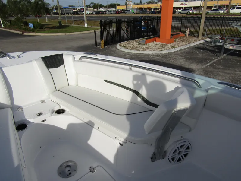 Slide: The Image of 2025 Wellcraft 243 Fisherman boat interior with seating and speaker. - 8