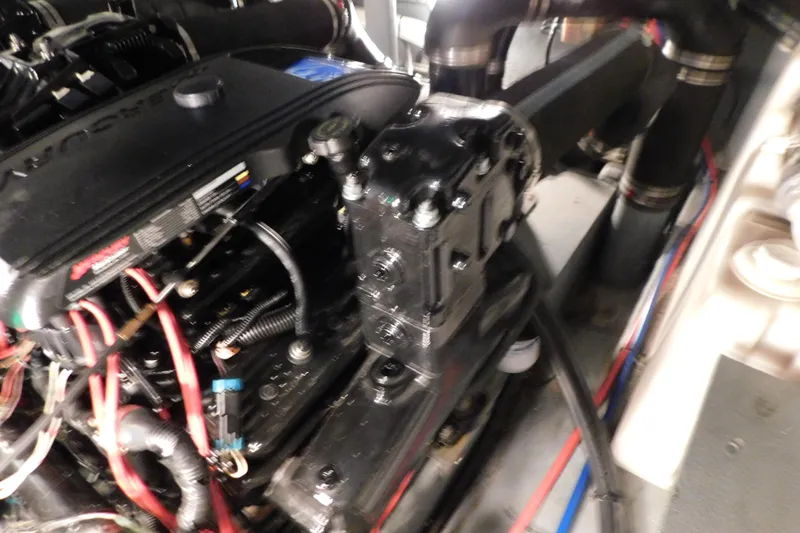 Slide: The Image of Engine compartment of a 2002 Sea Ray 340 Sundancer boat, showing detailed components and wiring. - 31