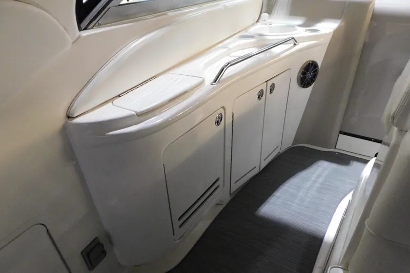 Slide: The Image of 2002 Sea Ray 340 Sundancer interior with sleek cabinetry and modern design. - 9
