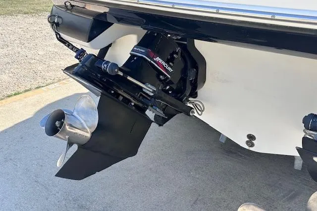 Slide: The Image of 2001 Sea Ray 290 Bowrider boat stern with MerCruiser outdrive and propeller. - 10