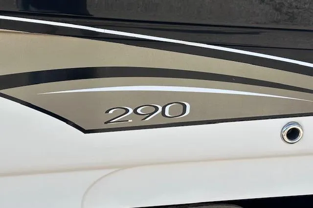 Slide: The Image of Close-up of 2001 Sea Ray 290 Bowrider boat model number on hull. - 3