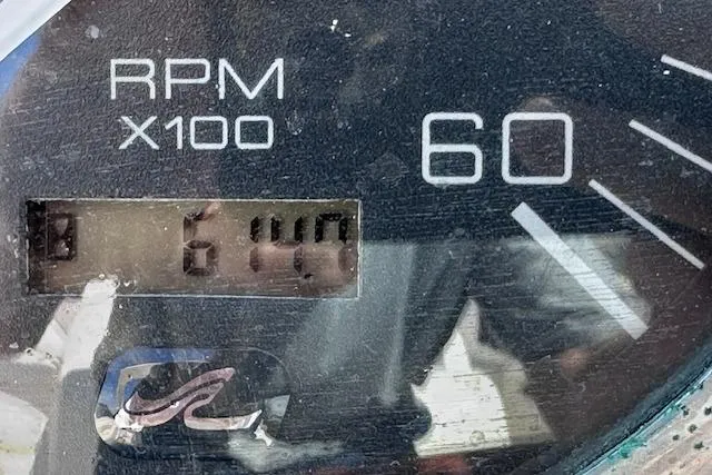 Slide: The Image of Tachometer of 2001 Sea Ray 290 Bowrider showing 6140 RPM. - 33