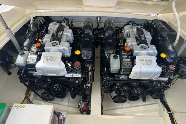 Slide: The Image of Twin engines of a 2017 Chris-Craft Corsair 32 boat, showcasing powerful V8 blocks. - 24