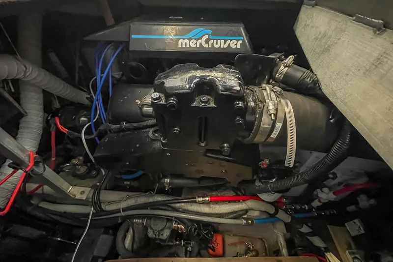 Slide: The Image of Engine compartment of a 1990 Carver 32 Montego with MerCruiser components. - 40