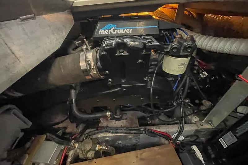 Slide: The Image of Engine compartment of a 1990 Carver 32 Montego with MerCruiser components. - 41