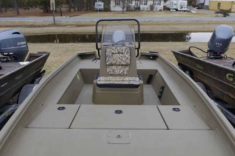 Slide: The Image of 2026 G3 Gator Tough 17 CC boat with camouflage seating and Yamaha outboard motor. - 6