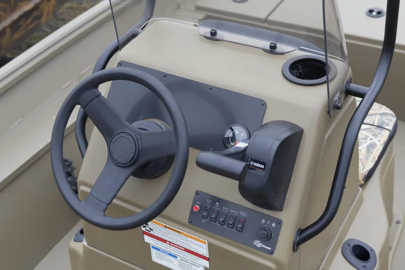 Slide: The Image of 2026 G3 Gator Tough 17 CC boat console with steering wheel and Yamaha controls. - 8