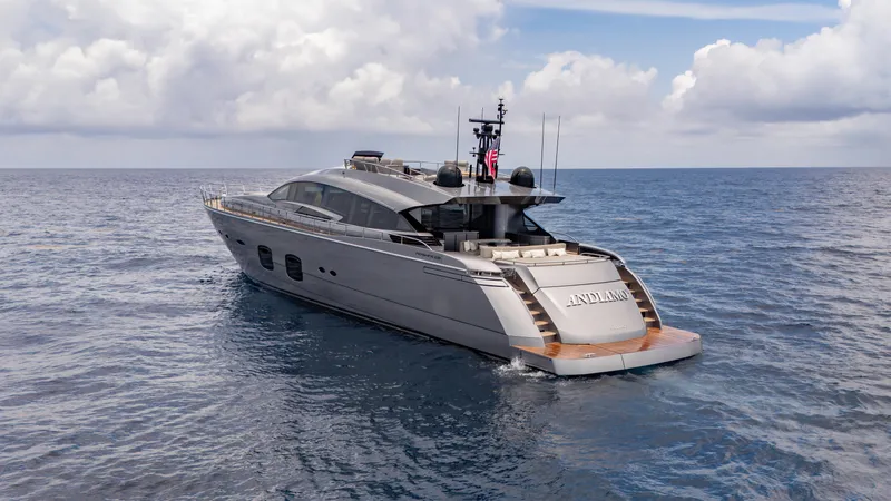 Slide: The Image of Luxurious 2021 Pershing 108 yacht cruising on open sea under cloudy sky. - 10