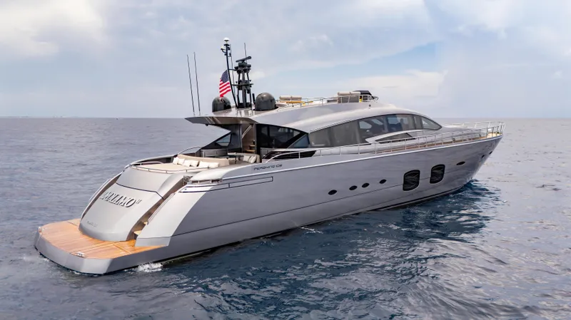 Slide: The Image of Luxury 2021 Pershing 108 yacht cruising on open sea under cloudy sky. - 12