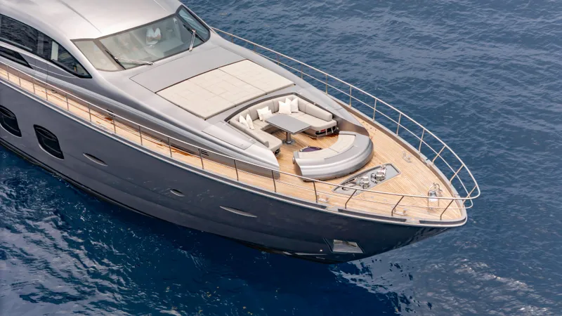 Slide: The Image of Luxurious 2021 Pershing 108 yacht with sleek design and spacious deck on blue ocean. - 18