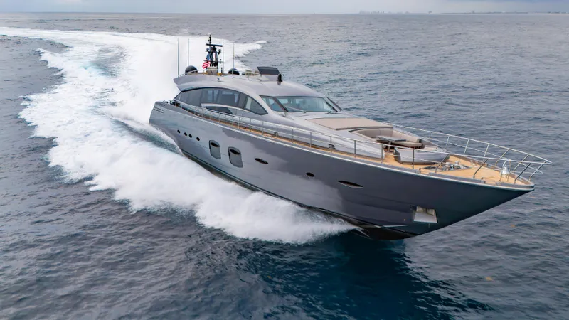 Slide: The Image of 2021 Pershing 108 yacht cruising on open sea, showcasing sleek design and luxury. - 29