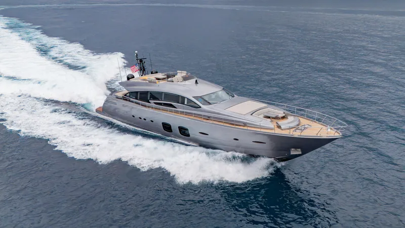 Slide: The Image of Luxurious 2021 Pershing 108 yacht cruising swiftly on open sea. - 32