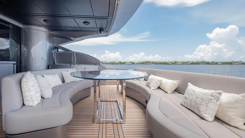 Slide: The Image of Luxurious 2021 Pershing 108 yacht deck with elegant seating and ocean view. - 39