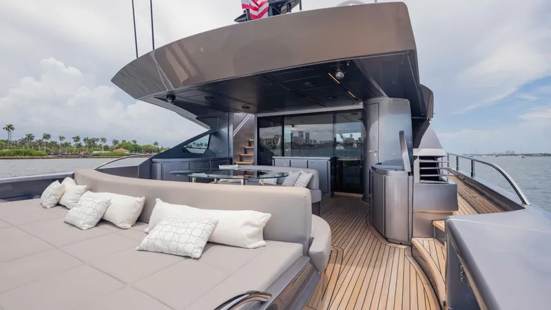 Slide: The Image of Luxurious 2021 Pershing 108 yacht deck with elegant seating and ocean view. - 40