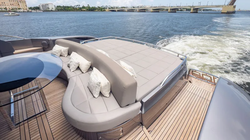 Slide: The Image of Luxurious 2021 Pershing 108 yacht deck with elegant seating and scenic water view. - 41