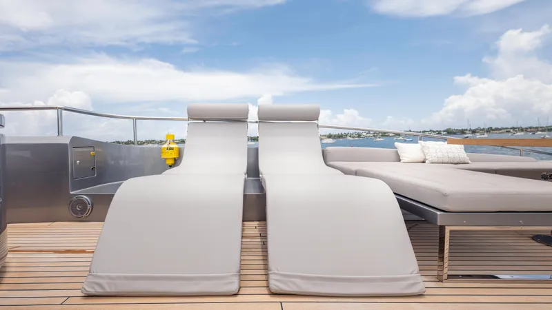 Slide: The Image of Luxury sun loungers on Pershing 108 yacht deck, 2021 model, with ocean view. - 44
