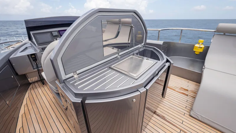Slide: The Image of Luxury outdoor kitchen on 2021 Pershing 108 yacht with ocean view. - 49