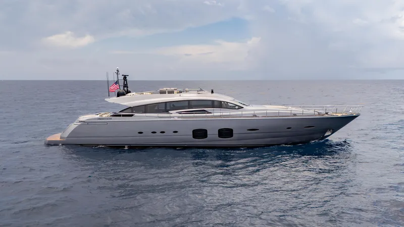 Slide: The Image of 2021 Pershing 108 yacht cruising on open sea under cloudy sky. - 5