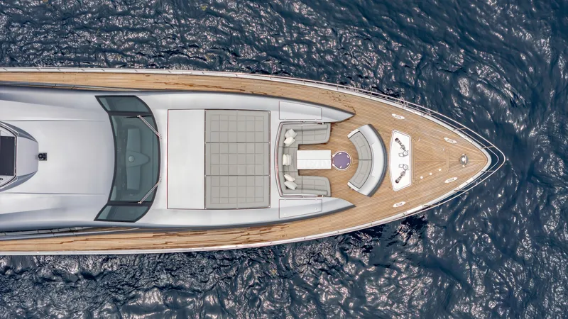 Slide: The Image of Aerial view of 2021 Pershing 108 yacht on open water. - 9