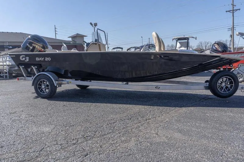 The Image of 2026 G3 Bay 20 boat on trailer, parked outdoors, showcasing sleek design and modern features. - 0