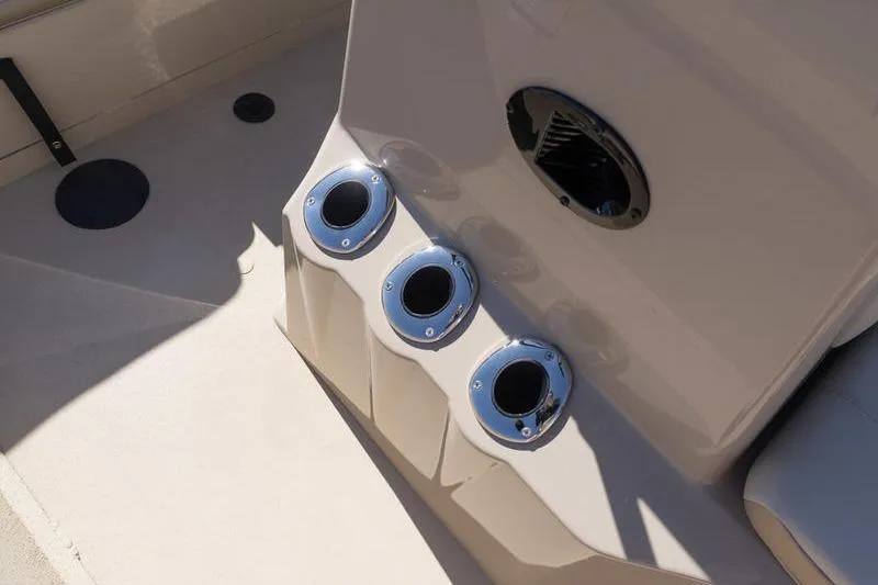 Slide: The Image of 2026 G3 Bay 20 boat console with three chrome cup holders. - 10