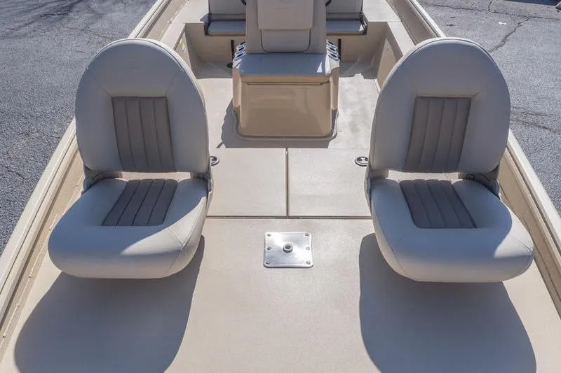 Slide: The Image of 2026 G3 Bay 20 boat interior with two cushioned seats and center console. - 13