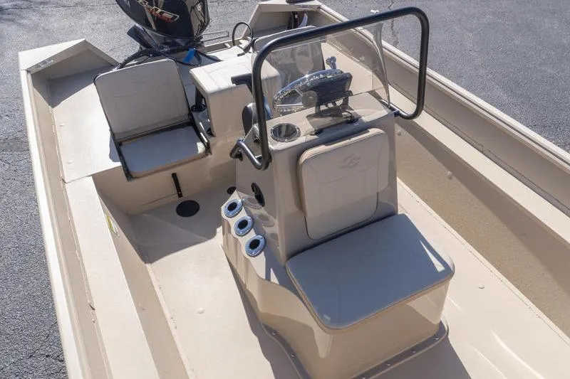 Slide: The Image of 2026 G3 Bay 20 boat interior with steering console and seating. - 9