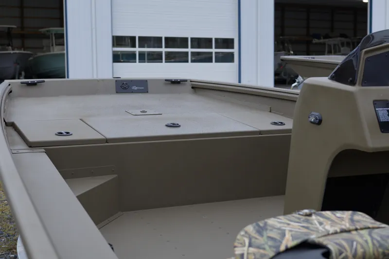 Slide: The Image of 2026 G3 Gator Tough 17 SC boat interior, showcasing spacious deck and console. - 10