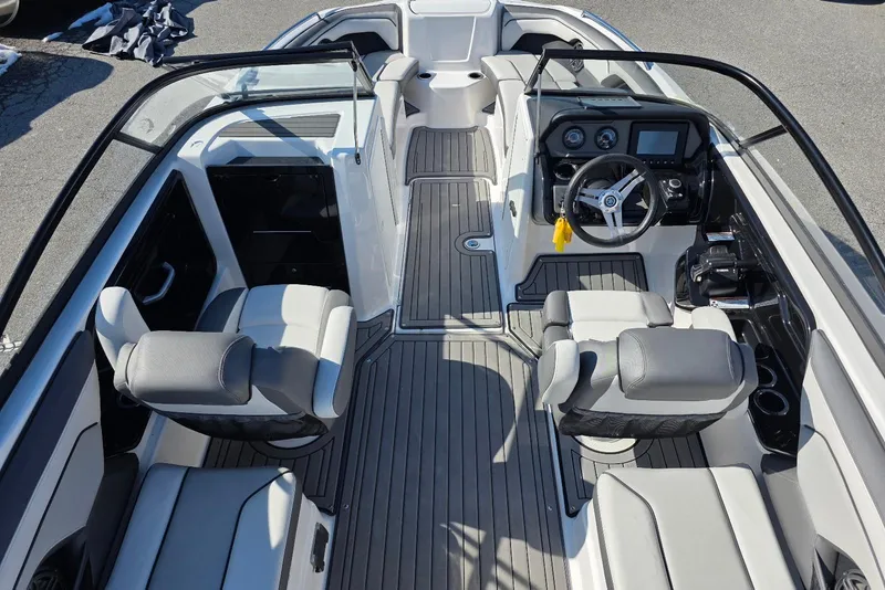 Slide: The Image of 2017 Yamaha Boats 212 Limited interior with sleek seating and modern dashboard. - 14