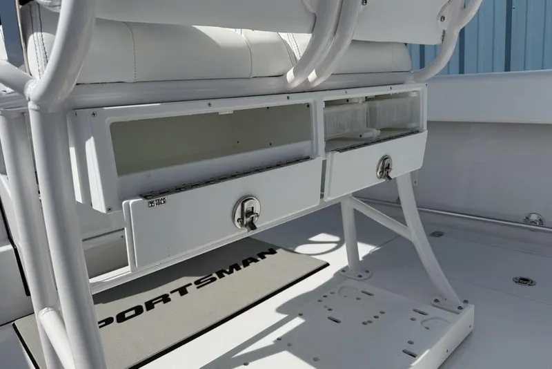 Slide: The Image of 2026 Sportsman Open 252 Center Console boat interior storage compartments. - 38