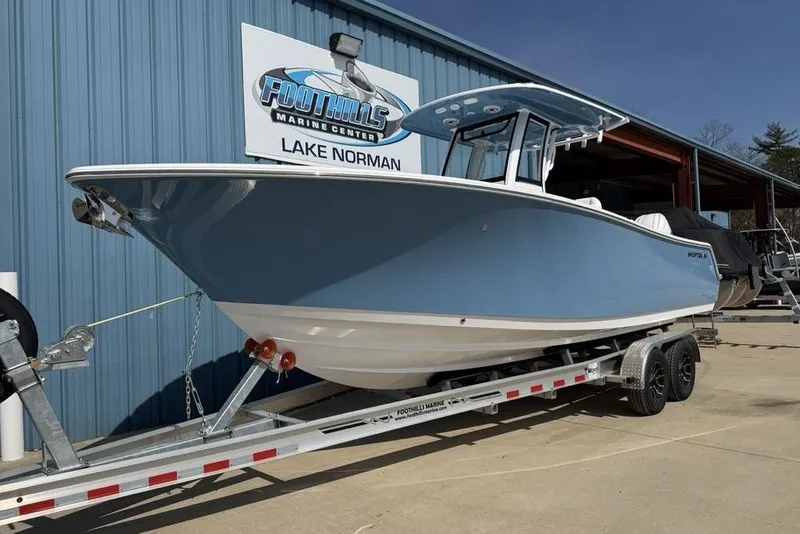 Slide: The Image of 2026 Sportsman Open 252 Center Console boat on trailer at Foothills Marine Center. - 4