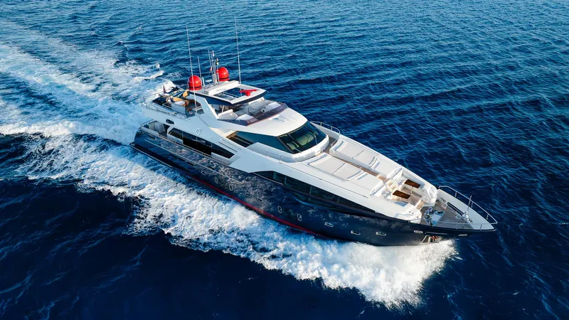 The Image of Luxurious 2012 Custom Line 100 yacht cruising on open blue sea. - 0