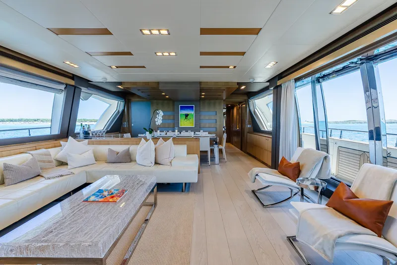 Slide: The Image of Luxurious interior of 2012 Custom Line 100 yacht with modern furnishings and panoramic windows. - 13