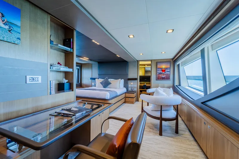 Slide: The Image of Luxurious yacht interior with modern furnishings, large windows, and elegant decor, Custom Line 100, 2012. - 17
