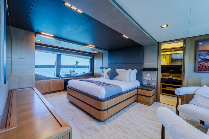 Slide: The Image of Luxurious yacht bedroom with ocean view, modern design, and elegant furnishings, Custom Line 100, 2012. - 19
