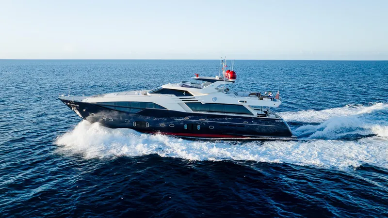 Slide: The Image of Luxurious 2012 Custom Line 100 yacht cruising on open sea under clear skies. - 2