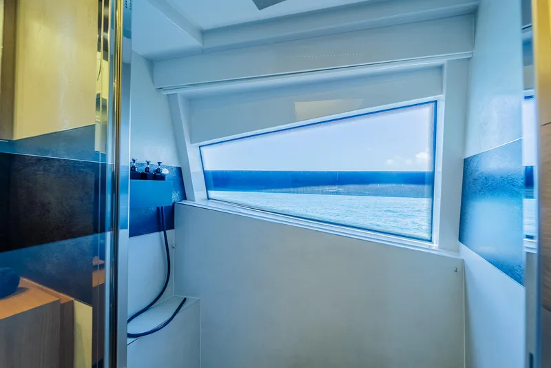 Slide: The Image of Luxurious yacht interior with ocean view through angular window, Custom Line 100, 2012 model. - 21