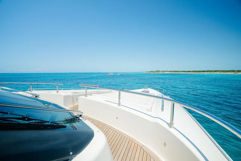 Slide: The Image of Luxurious Custom Line 100 yacht cruising on clear blue ocean, 2012 model. - 46